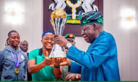 Mr. President, It’s time to honour our wounded soldiers too, like the Super Falcons Tinubu holding Cup won by Super Falcons