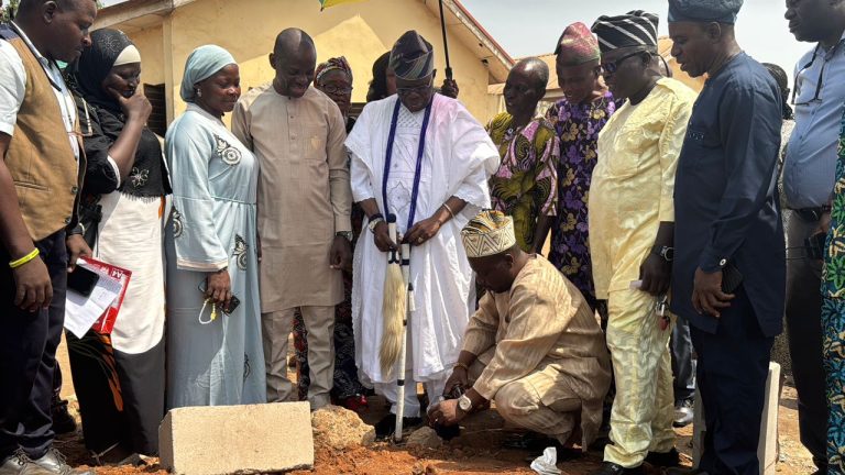 SDNON president Adeniyi lays foundation for solar-powered toilet at his alma mater, Sagamu High School